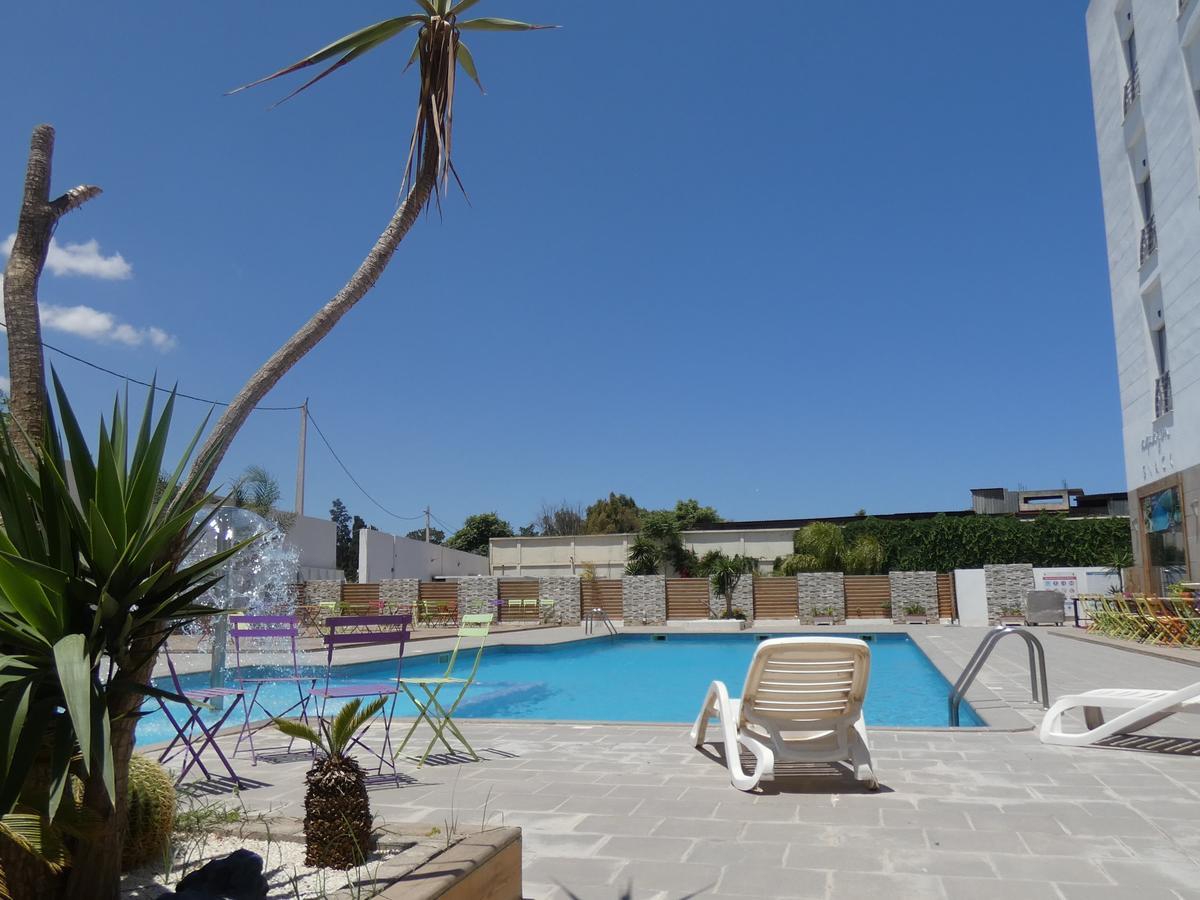 Le Zenith Hotel Oran Bagian luar foto